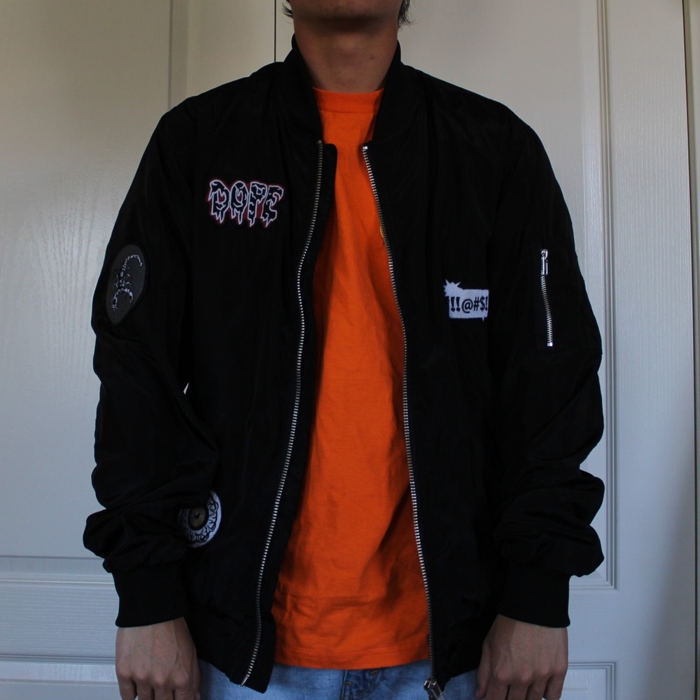 black rocker windbreaker with super sick patches